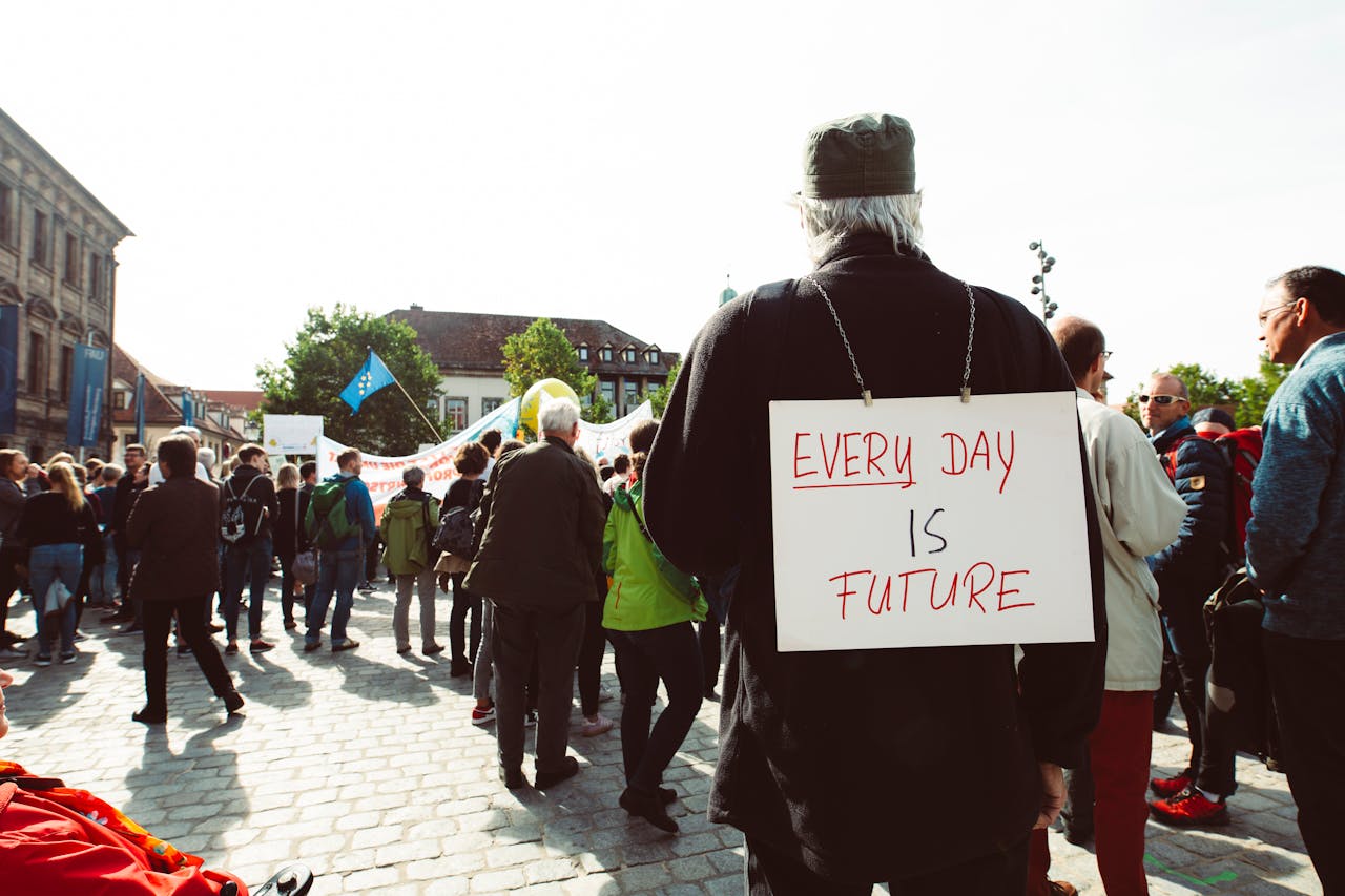 Free stock photo of activists, climate activist, cobblestone street